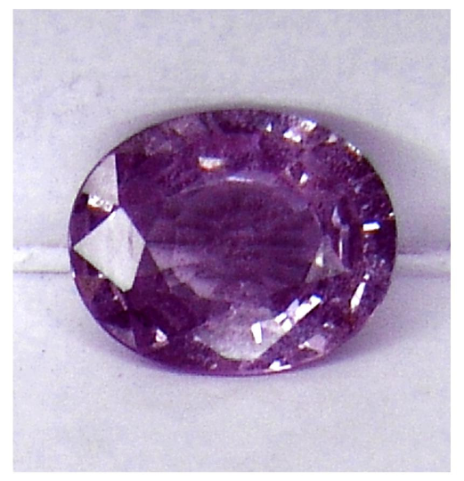 Ceylon NATURAL UNTREATED VS eye clean intense pinkish purple precision oval cut Sapphire from Sri Lanka 3.72ct.