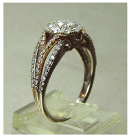 Ladies 14kt. white & rose gold split shank diamond halo engagement ring 1.60tcw