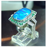 Ladies custom 18kt. white & rose gold crystal boulder opal, Tsavorite, and diamond ring