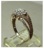 Ladies 14kt. white & rose gold split shank diamond halo engagement ring 1.60tcw